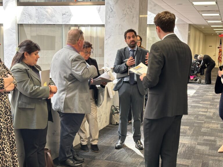 Councilmember Karbassi speaking with Senator Padilla's staff